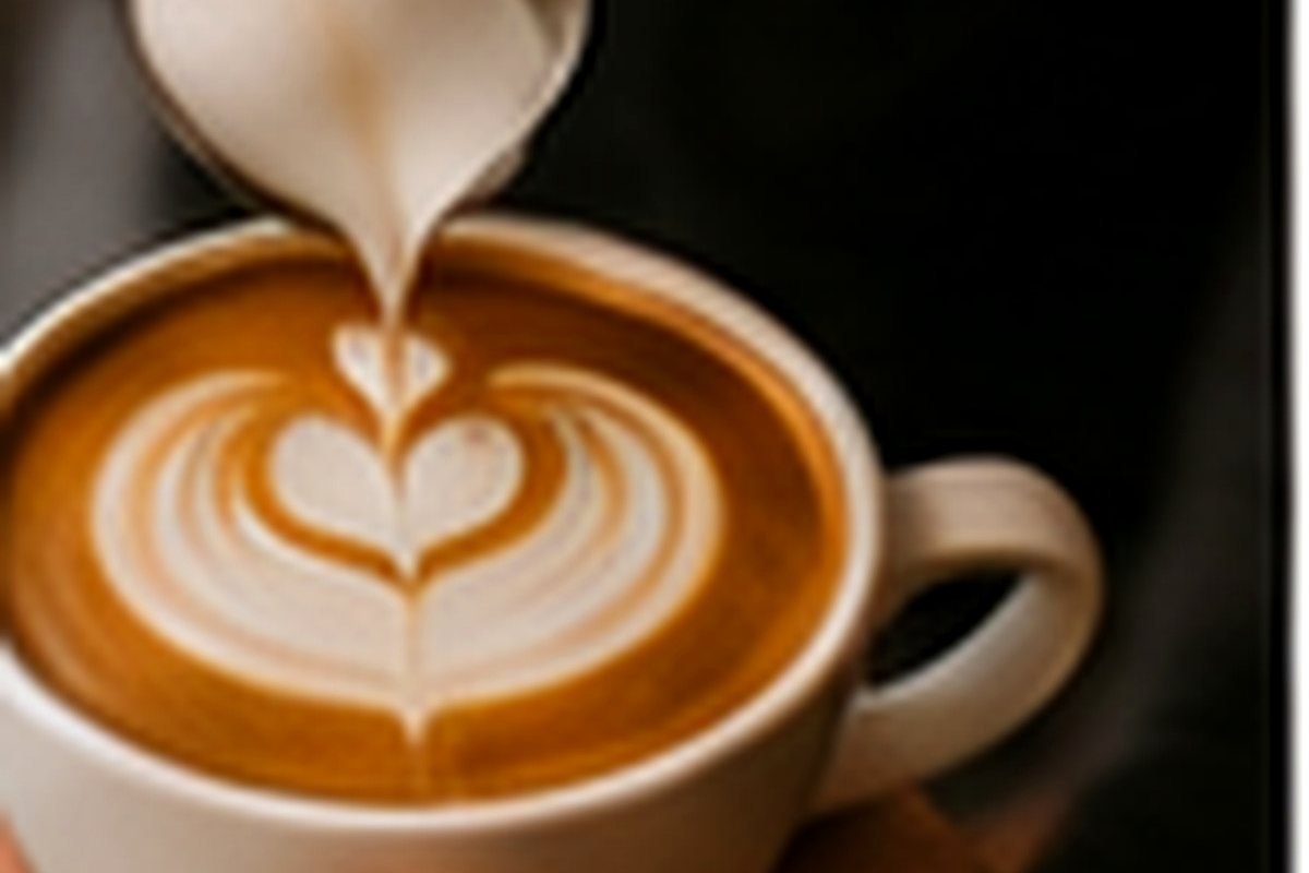 Latte art in een cappuccino, van bovenaf
